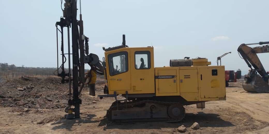 Tracked drilling equipment at a project site